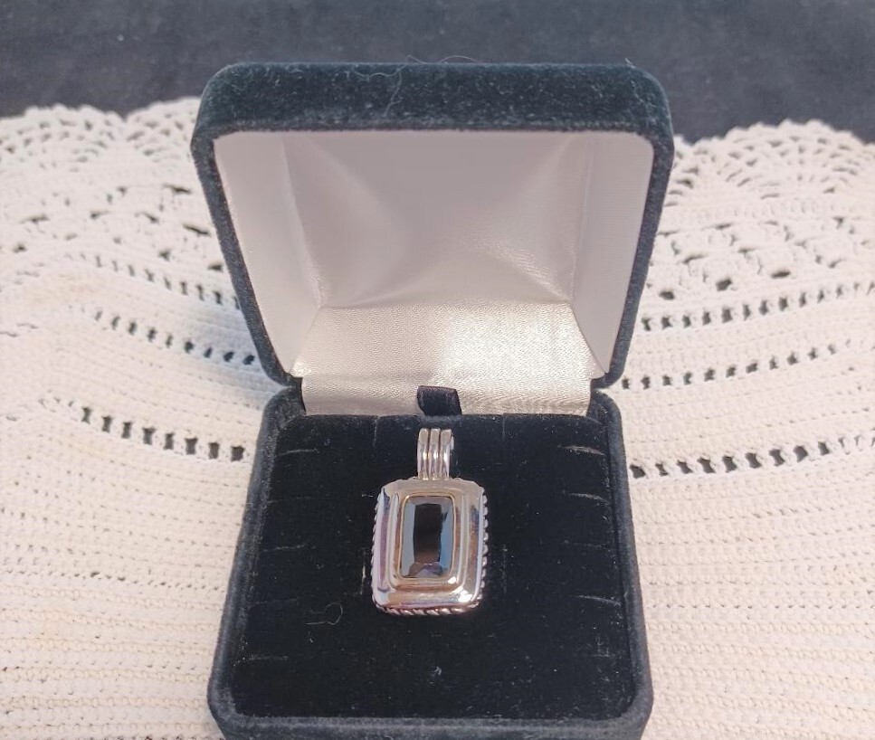 Black Faceted Glass and Silver Tone Pendant