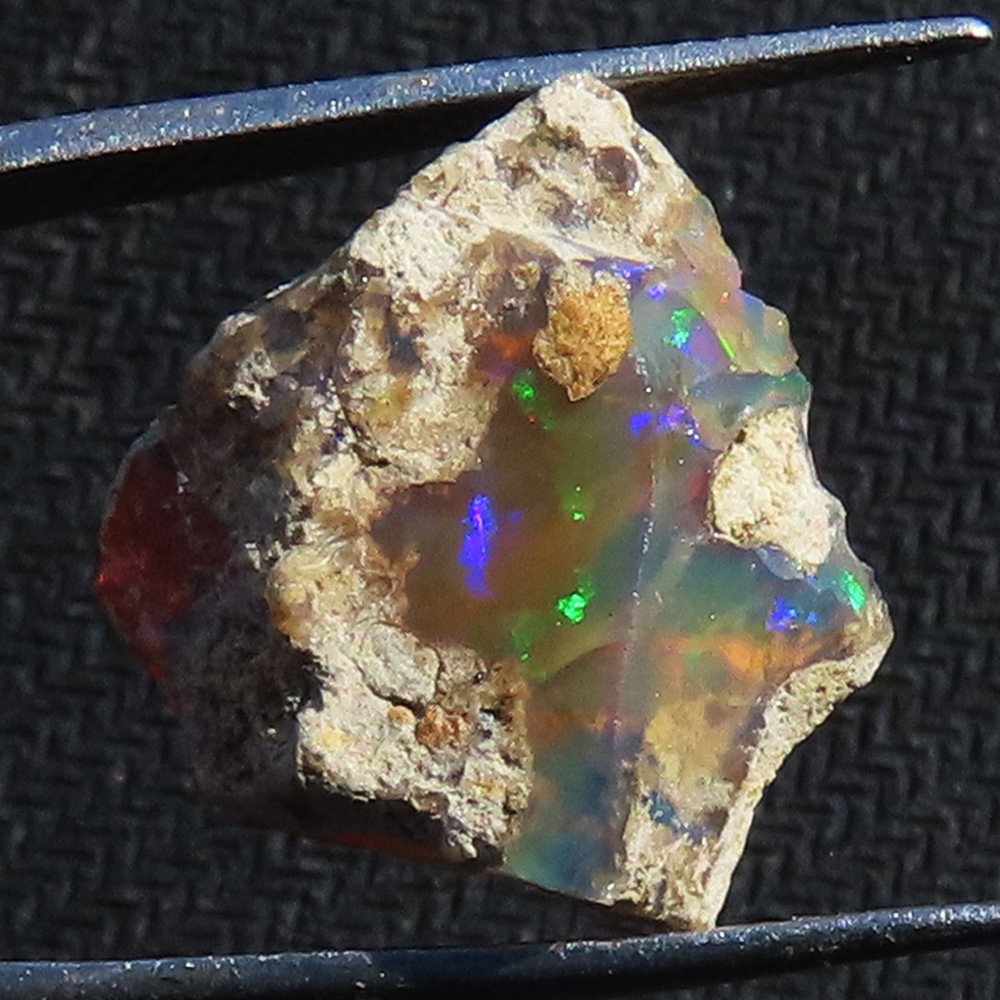 NATURAL PLAY OF COLOR ETHIOPIAN OPAL ROUGH GEMSTONE 8.70 Cts. (14X16X08 mm) N_05