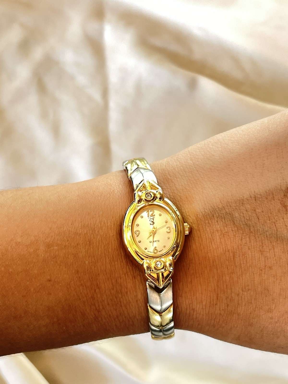 Vintage Sergio Valente Women’s Oval Quartz Analog Wristwatch Two-Tone Gold Dial