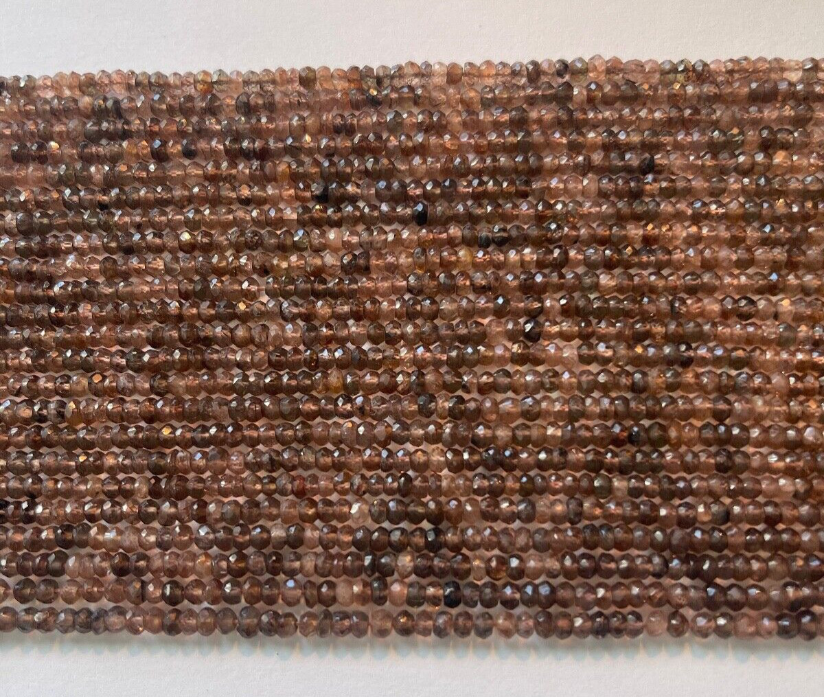 ONE STRAND ANDALUSITE 3.75 MM FACETED RONDELLES STRAND IS 13.75″ BELOW WHOLESALE