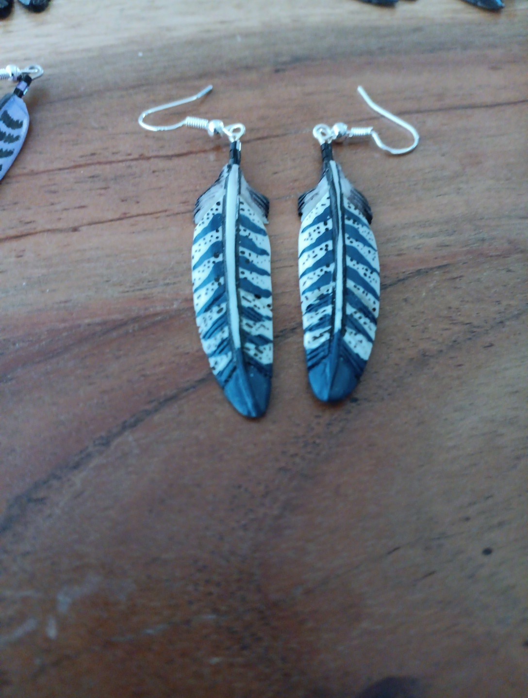 HANDMADE CARVED WATER BUFFALO BONE FEATHER EARRINGS AĹASKA BONE YARD COLLECTION