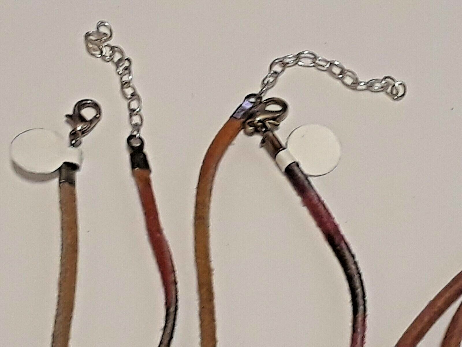 Animal shape pendants silver tone on leather rope chains 18″ long. 5 necklaces