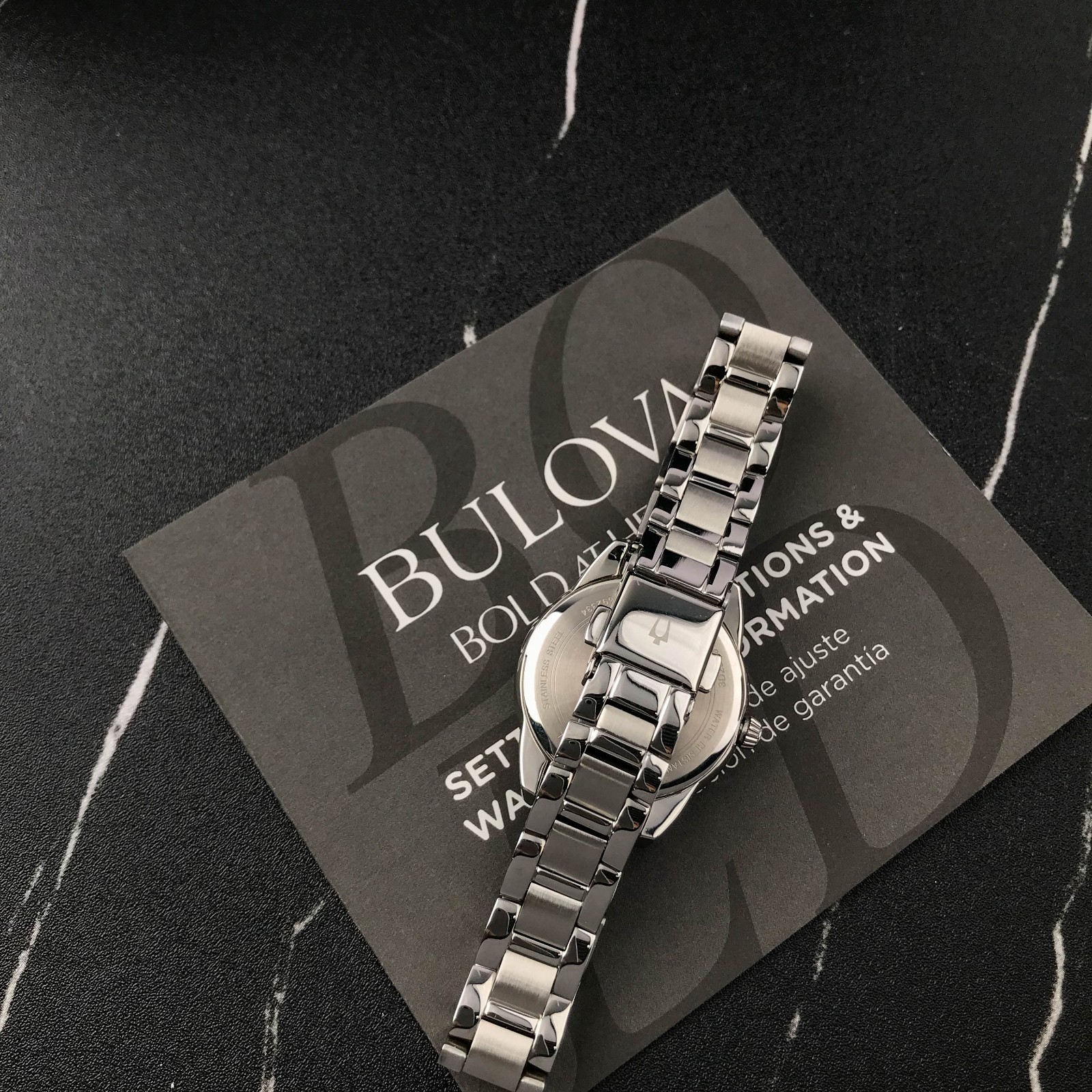 Bulova Classic Sutton 96P250 Blue Dial 28MM Quartz Ladies Watch with 11 Diamonds