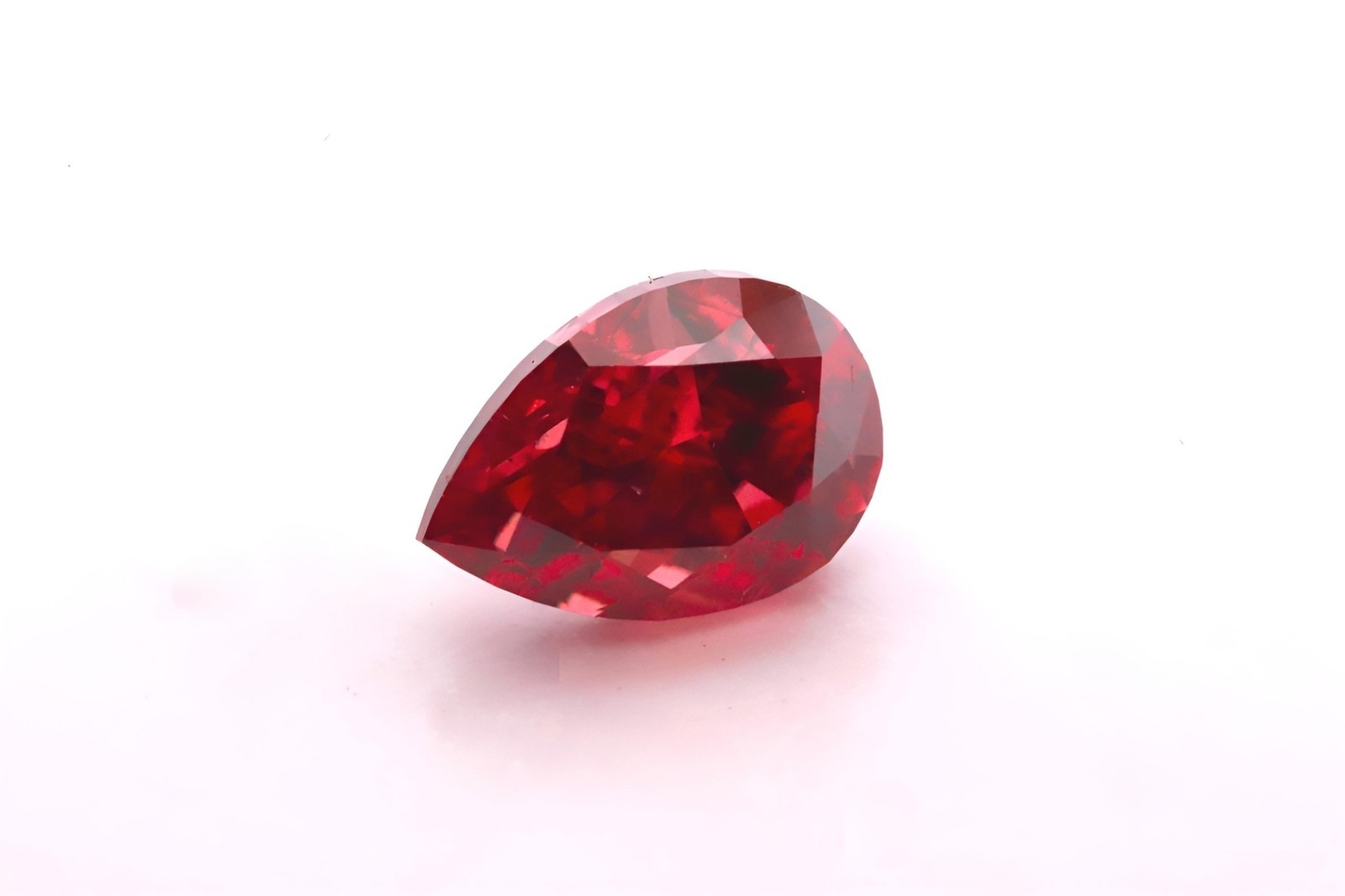 0.09ct Pear Mod Brilliant Fancy Deep Brown-Pink Diamond Red GIA Certified