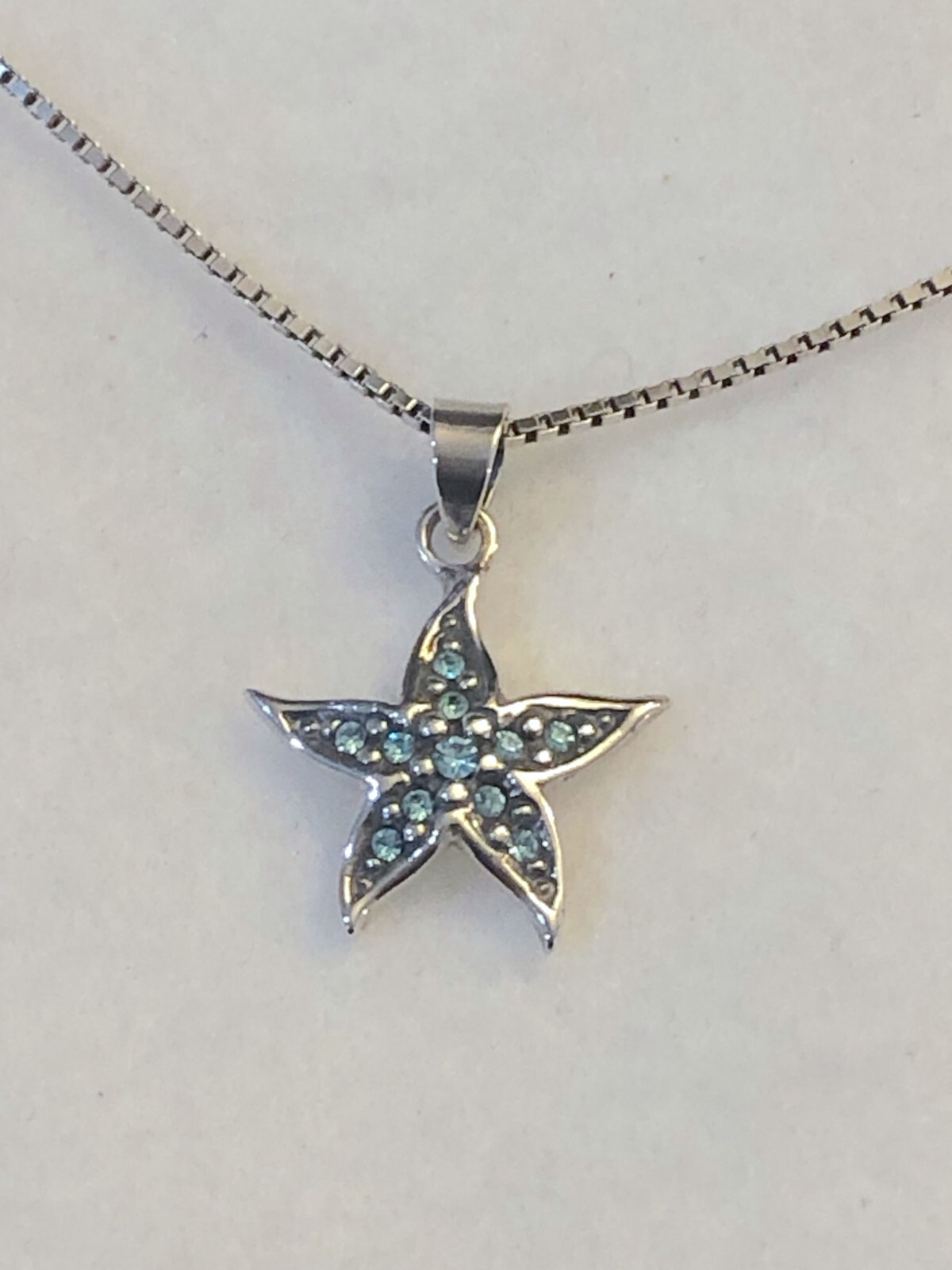 Wildthings Sterling Silver Starfish Pendant w/Faceted Aqua Crystal Stones