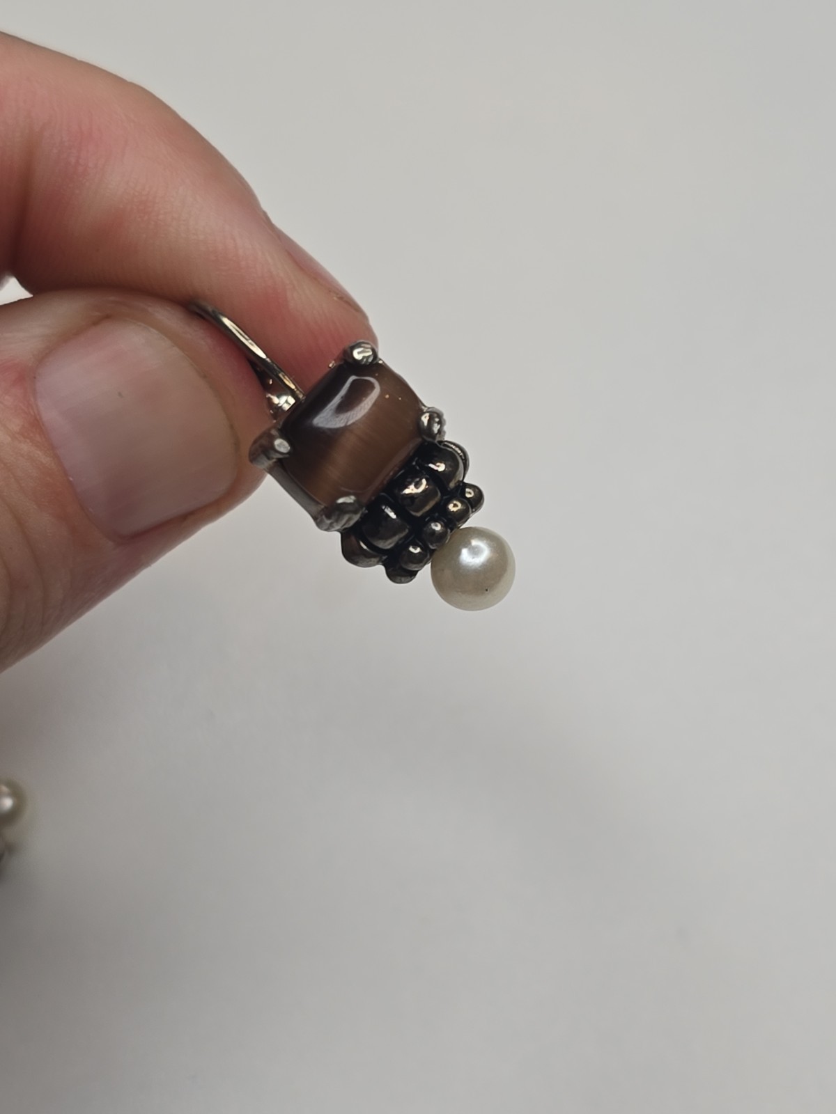 sterling silver Lagos earrings, smoky quartz stone and pearl accent.