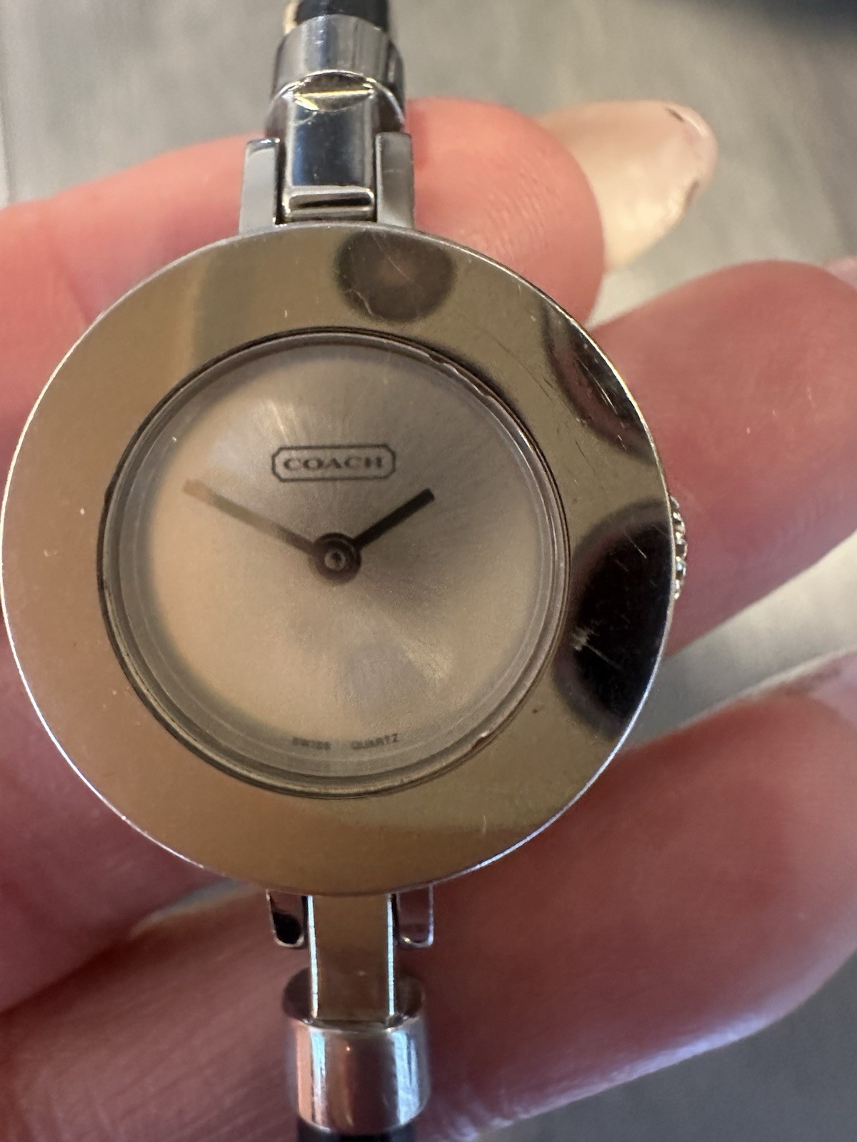 Coach Women’s Analog Quartz Wristwatch Silver Dial Black Leather Strap 3 ATM