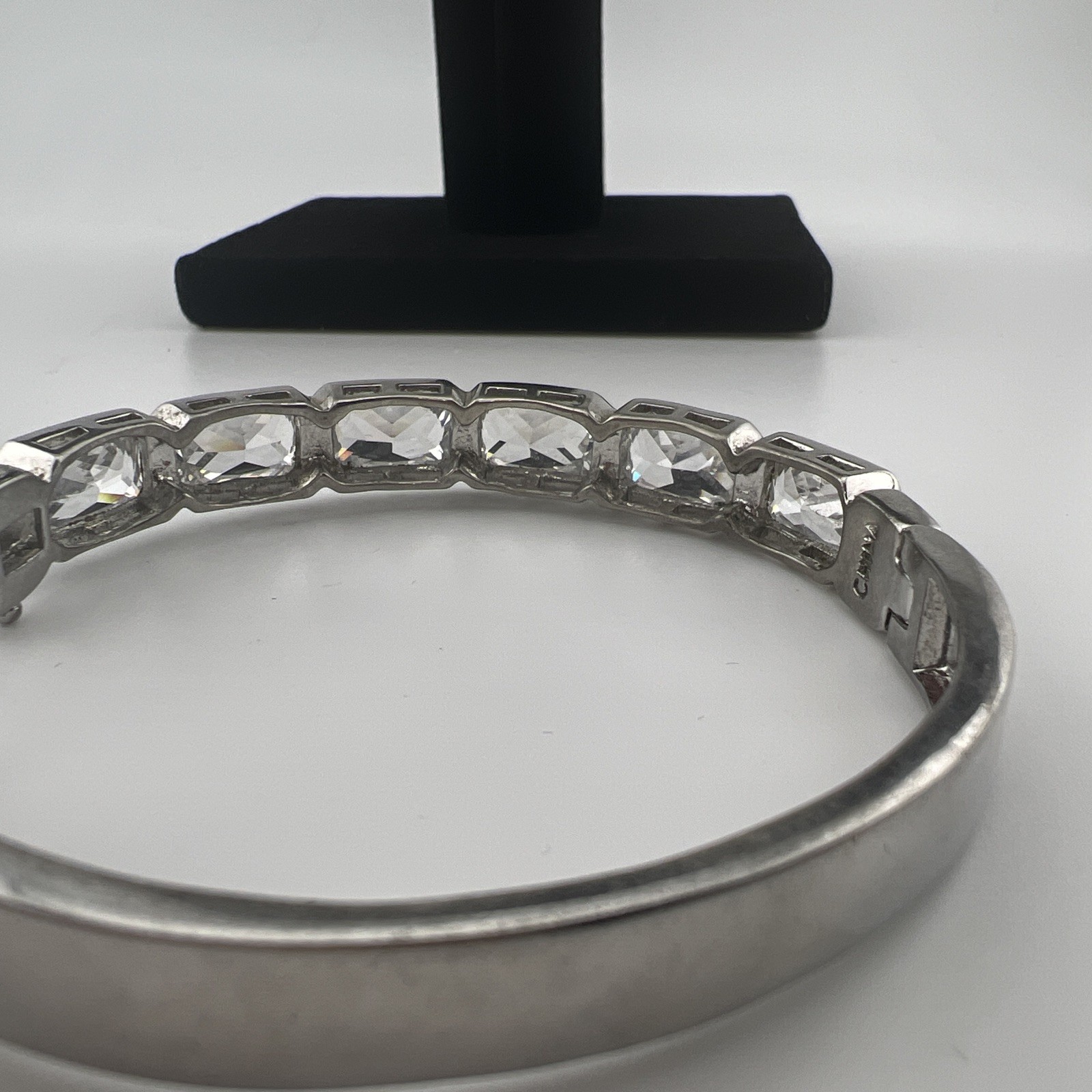 Real Collectibles Adrienne Diamonite Silver Tone Clear Crystal Hinged Bangle 7″