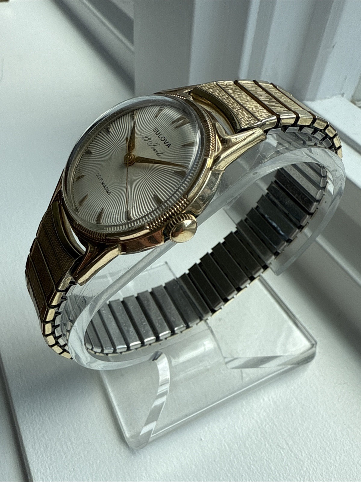 Vintage Bulova 23 Jewels White Sunburst Dial Stretch Band Excellent Works
