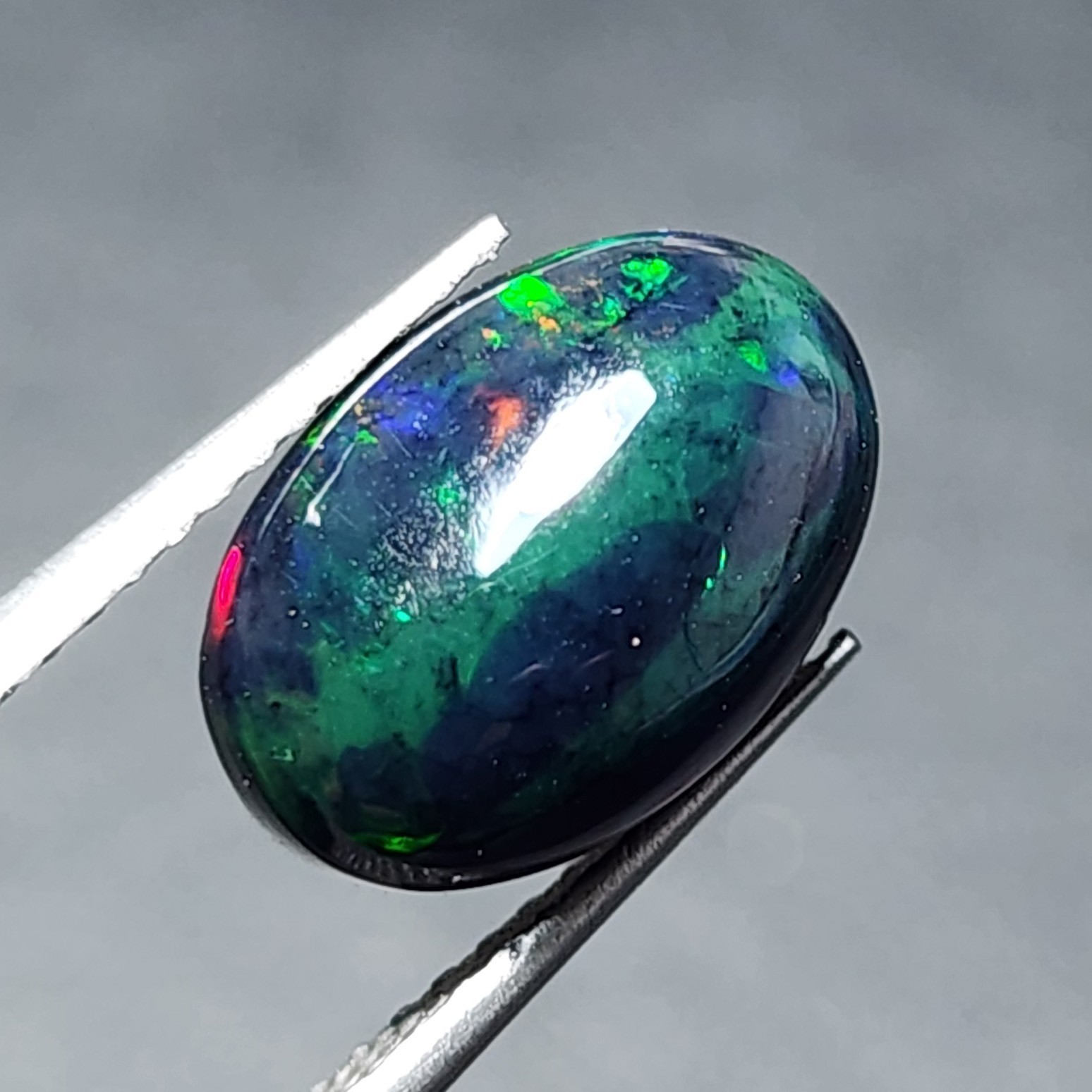 Natural Ethiopian Welo Black Opal AAA Oval Cabochon Strong Green Fire Gem 1.80Ct