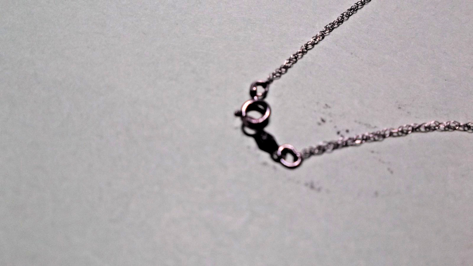 14K White Gold Round Diamond Disc Pendant Necklace 4.40 Grams in Lighted Display