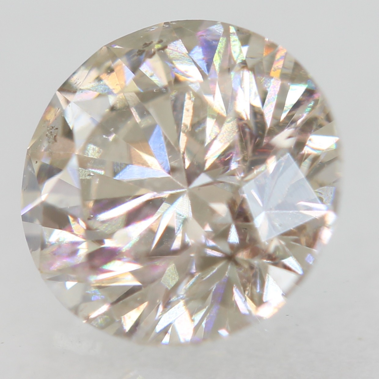Certified 0.70 Carat J SI1 Round Brilliant Natural Enhanced MINED Diamond 5.53mm