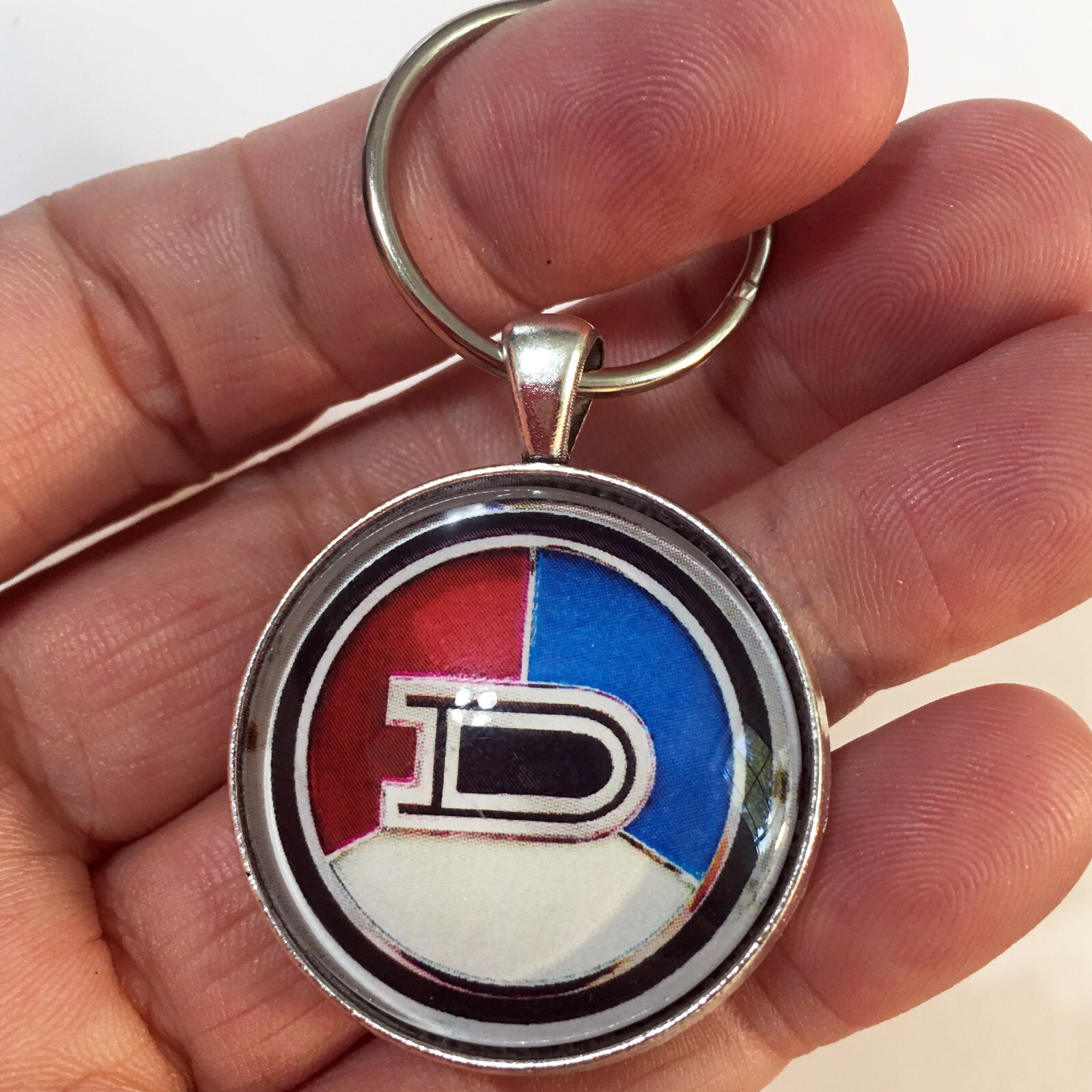 Vintage 1970-73 Datsun 1200 Coupe Grille Emblem 1.2″ Reproduction Keychain
