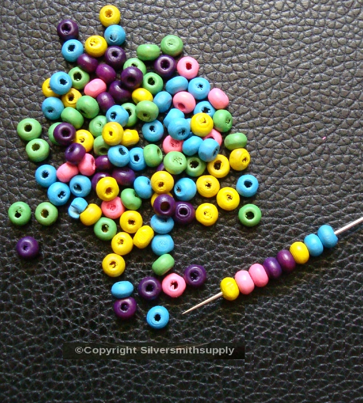 100 4mm Wood spacer beads Assorted Colors .5mm hole 12.5″ When Strung WB012