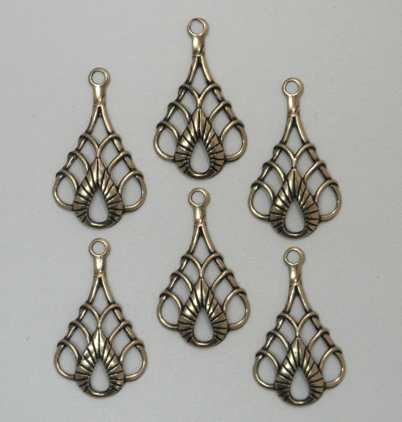 #3155 ANTIQUED GOLD CELTIC STYLE TEARDROP W/TOP HANG RING – 6 Pc Lot