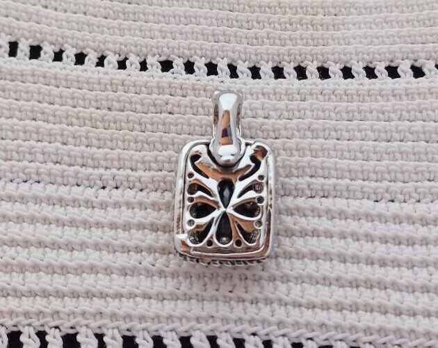 Black Faceted Glass and Silver Tone Pendant