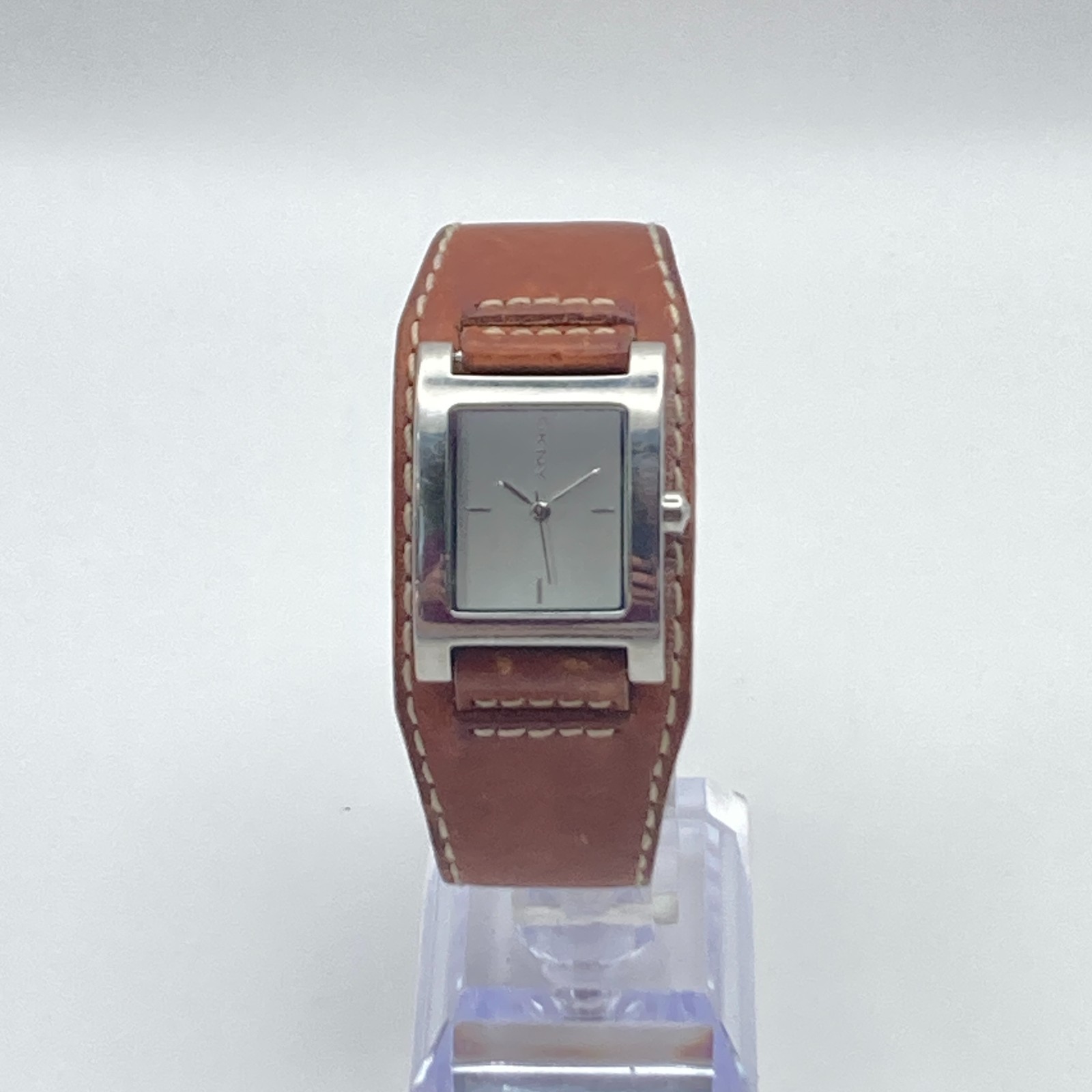 DKNY Women’s Watch 24mm Silver Tone Brown Leather Cuff 30M Tank New Battery 8″