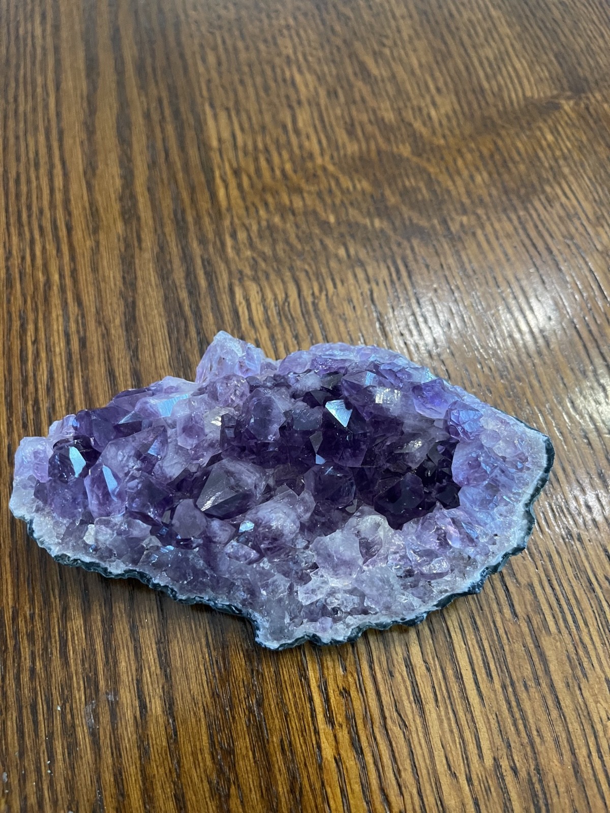Amethyst crystal 13 inches long, that is natural and weighs 1.3 pounds.