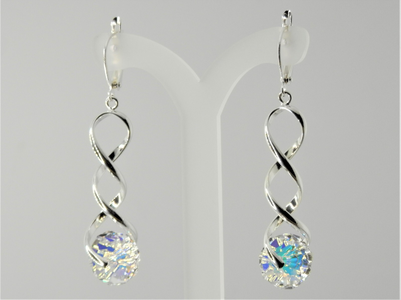Austrian Crystal, clear with AB, spiral silver plated, clip-on, lever back