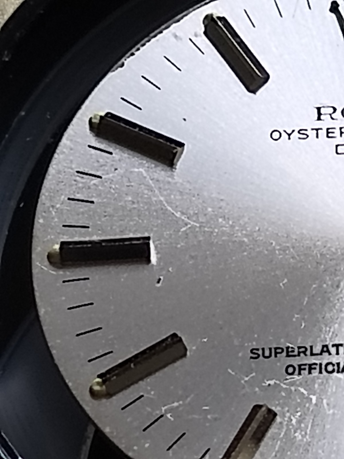 Rolex Oyster Perpetual Date Silver Metal Dial with Non-Numeric Hour Marks pn S2