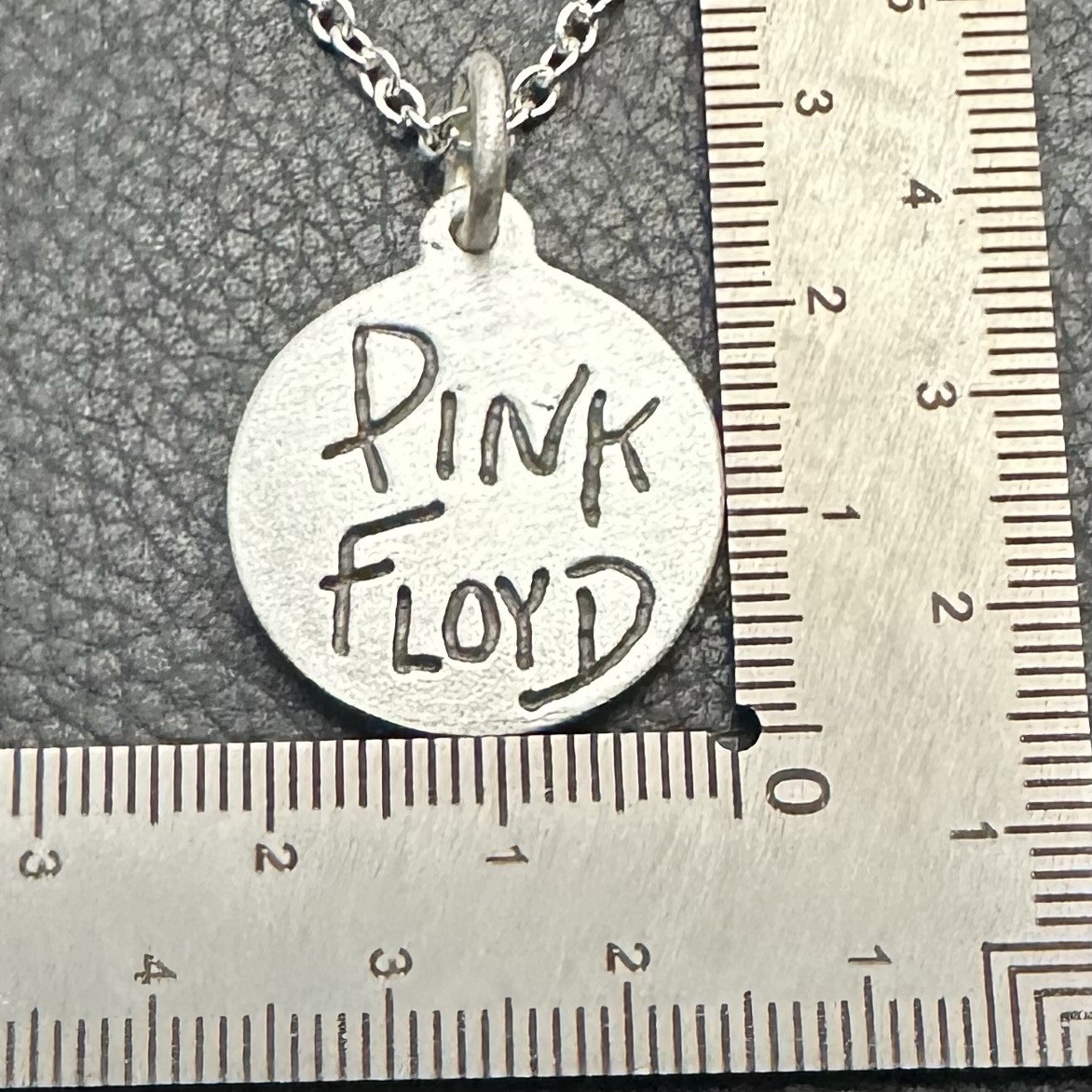MJG STERLING SILVER PINK FLOYD PENDANT. + CHAIN. 23mm. 5.7 GR.