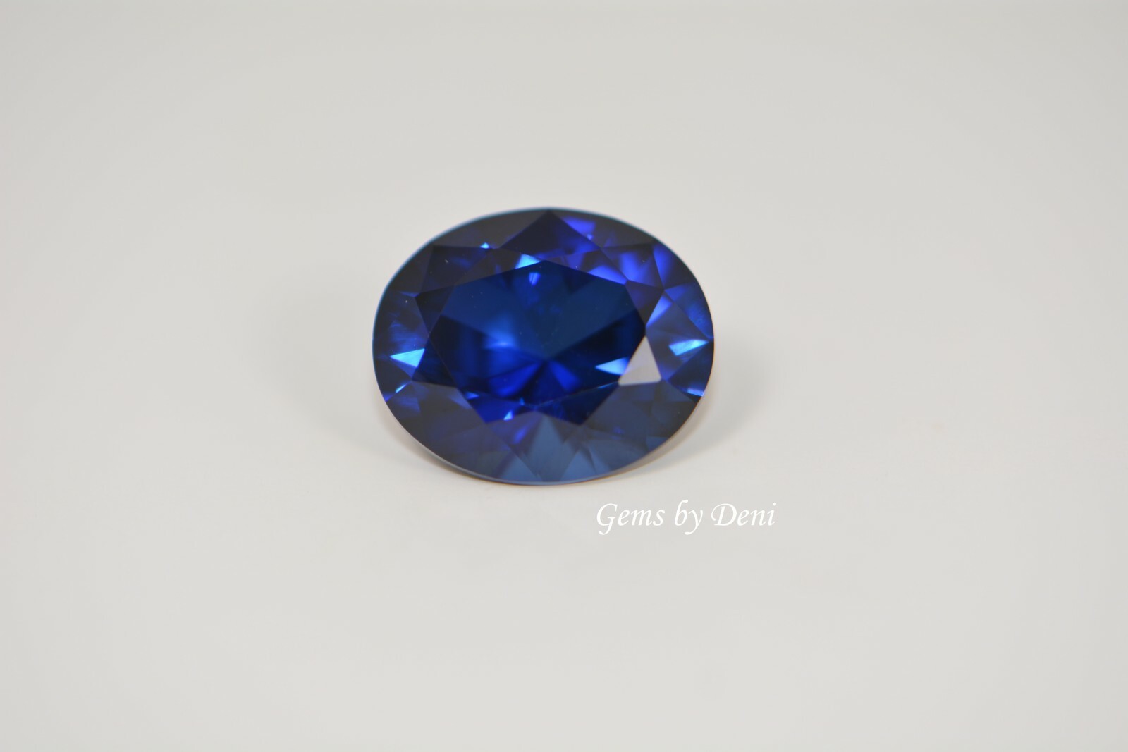 Lab-Created Blue Sapphire Oval Faceted (5x3mm to 16x12mm)