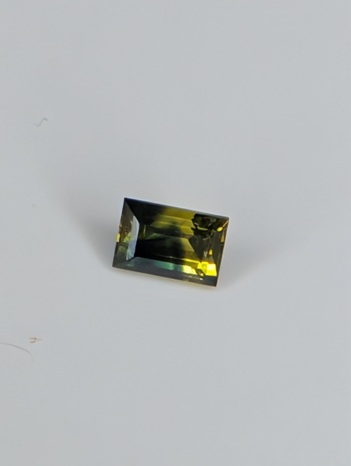 USA seller .63 IF Parti Sapphire faceted gemstone