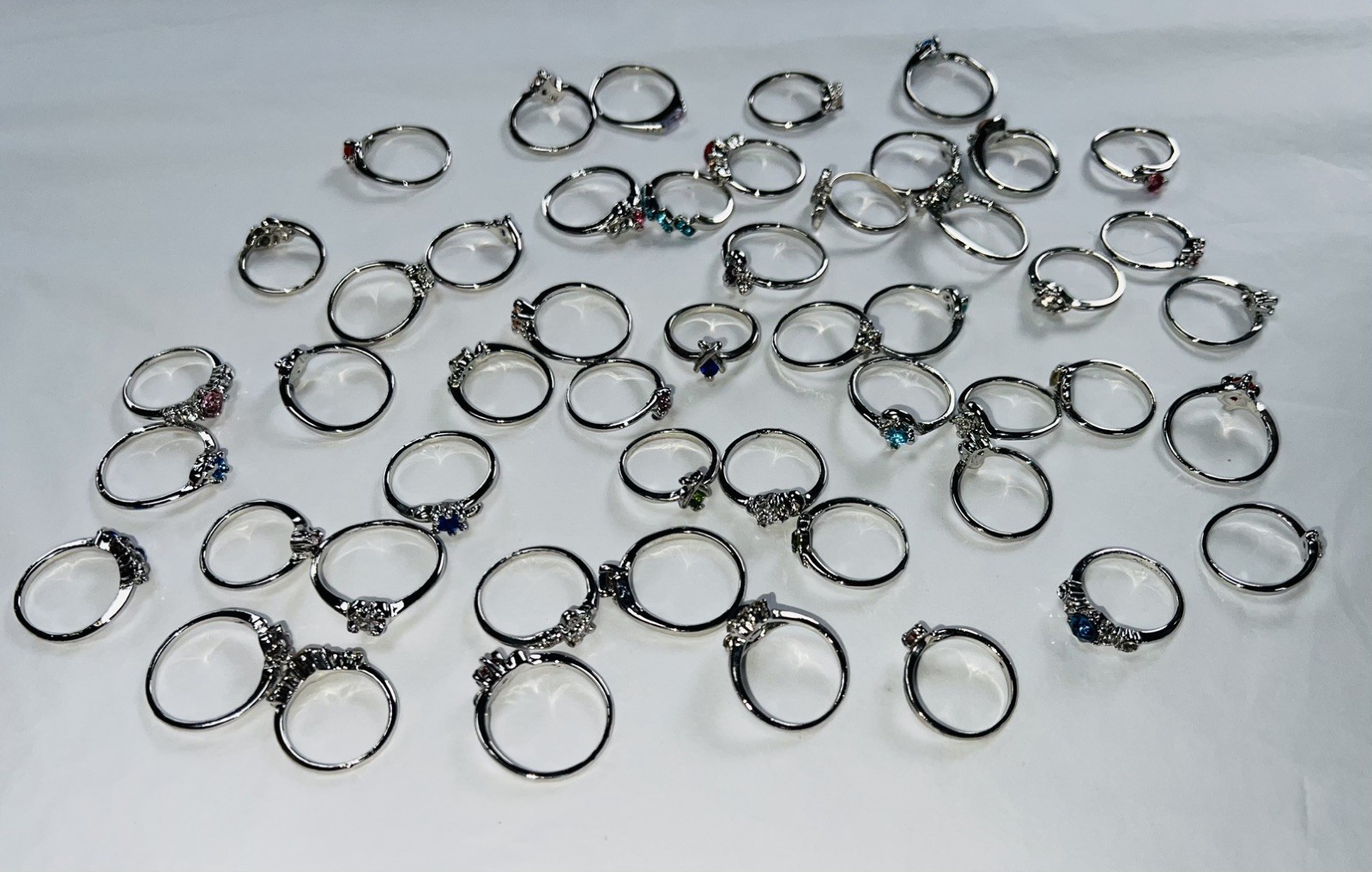 Bundle Of 50 Lovely Silver Coloured Rhinestone RINGS Single & Multiple Gem Stone