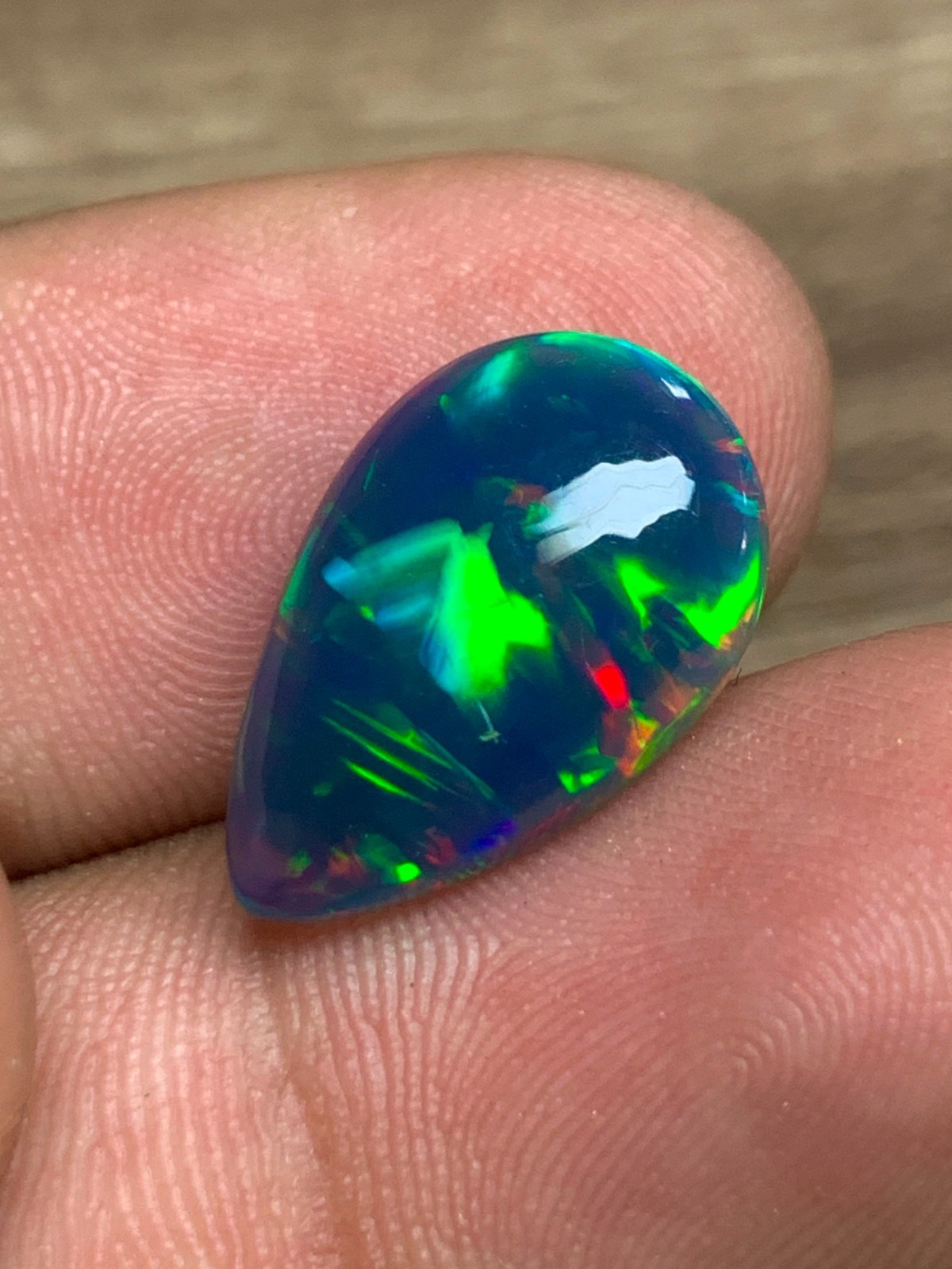 Ethiopian Opal Gemstone 4.65crt Pear Cabochon Black Welo Rainbow Flash Gemstone