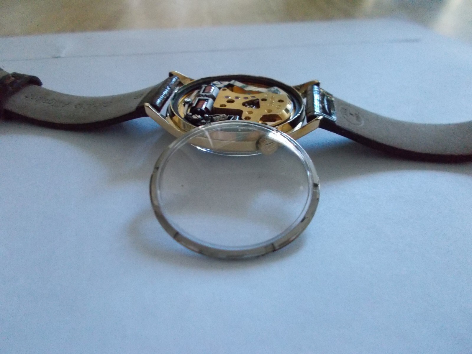 ACCUTRON 218 CLEAR EXHIBITION CASE BACK W/ RING with before and after photos