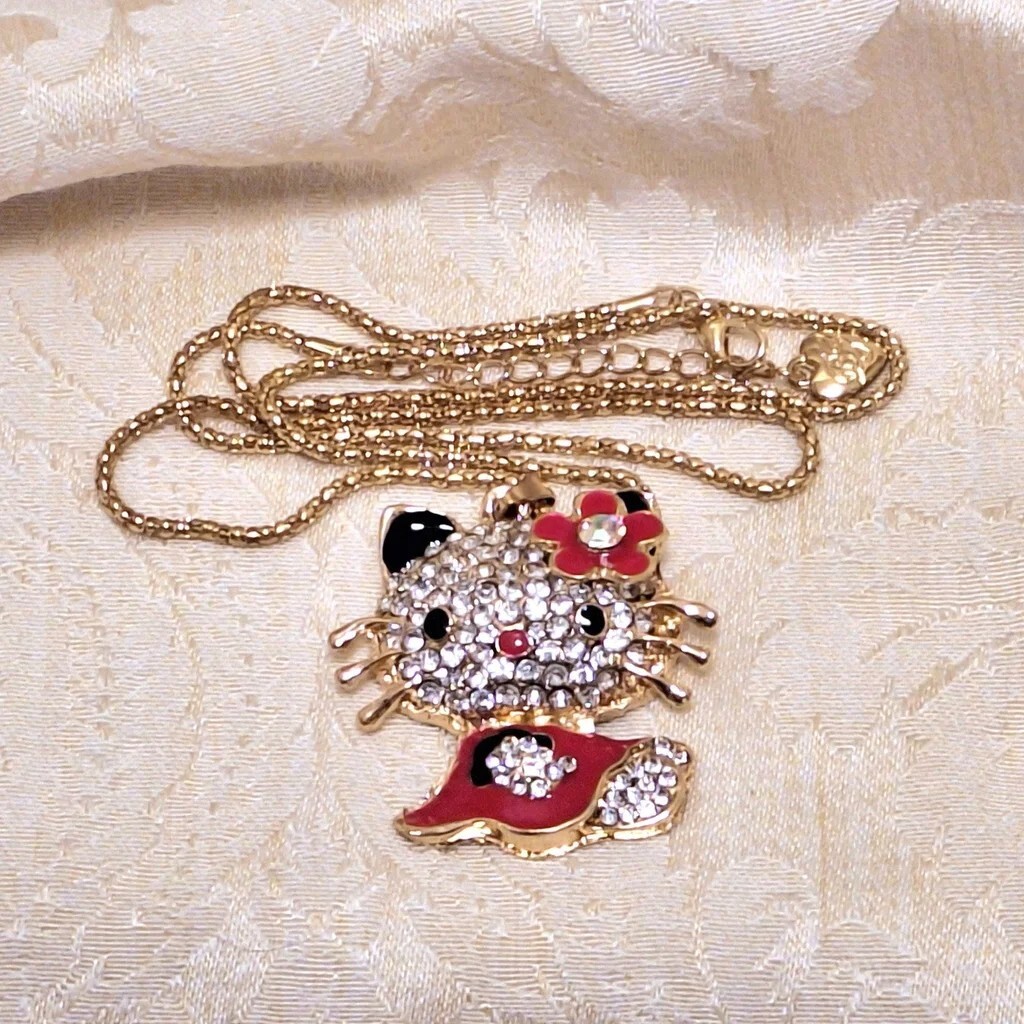 “Hello Kitty” cat pendant necklace Red & black enamel, silver rhinestones