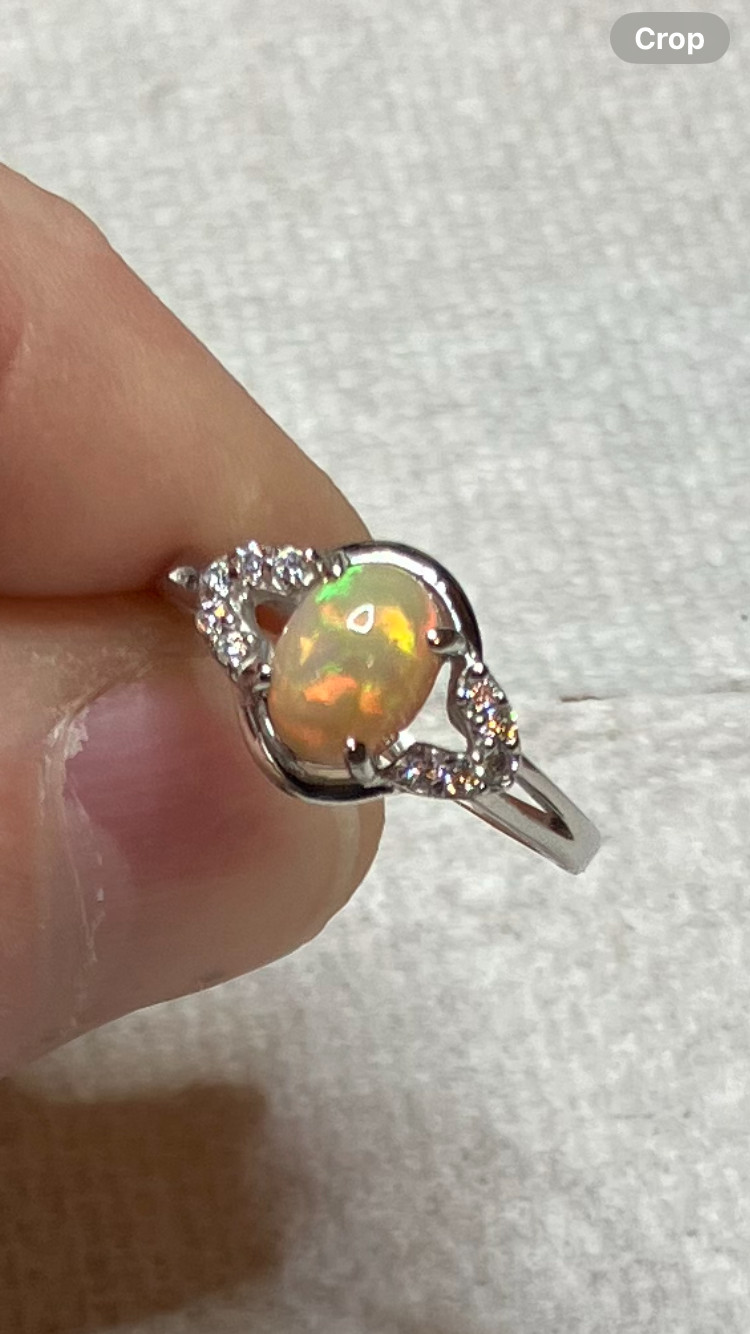 #138B- 0.95ct Genuine Ethiopian Welo Opal set in a Size 8.5 Sterling Silver Ring