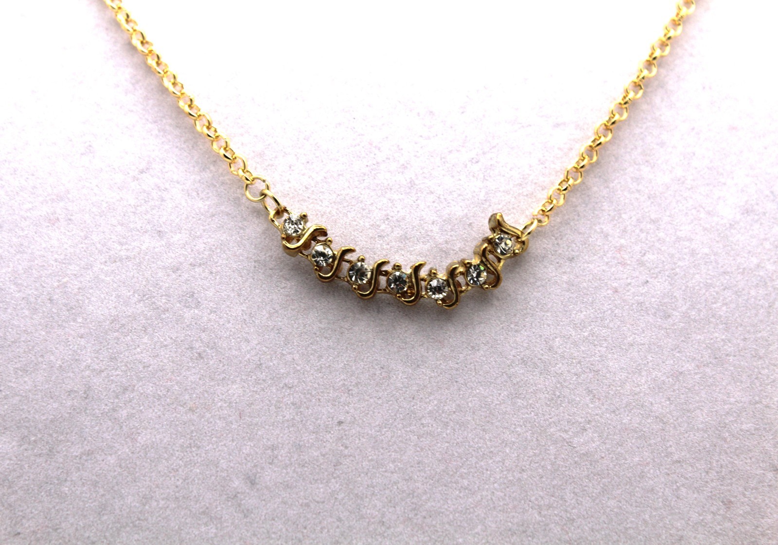 Handcrafted 21″ gold chain with 7 zirconias pendant necklace