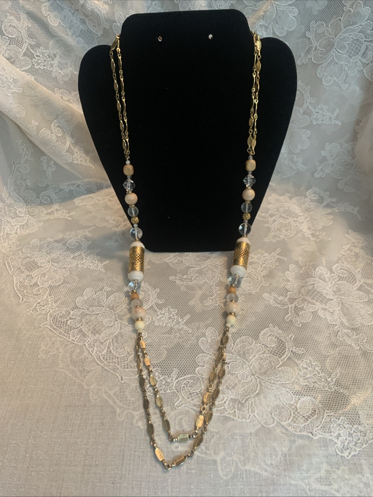 1928 Shiny Gold Tone 36″ Double Chain Necklace Clear, Beige, Gold, Wood Beads