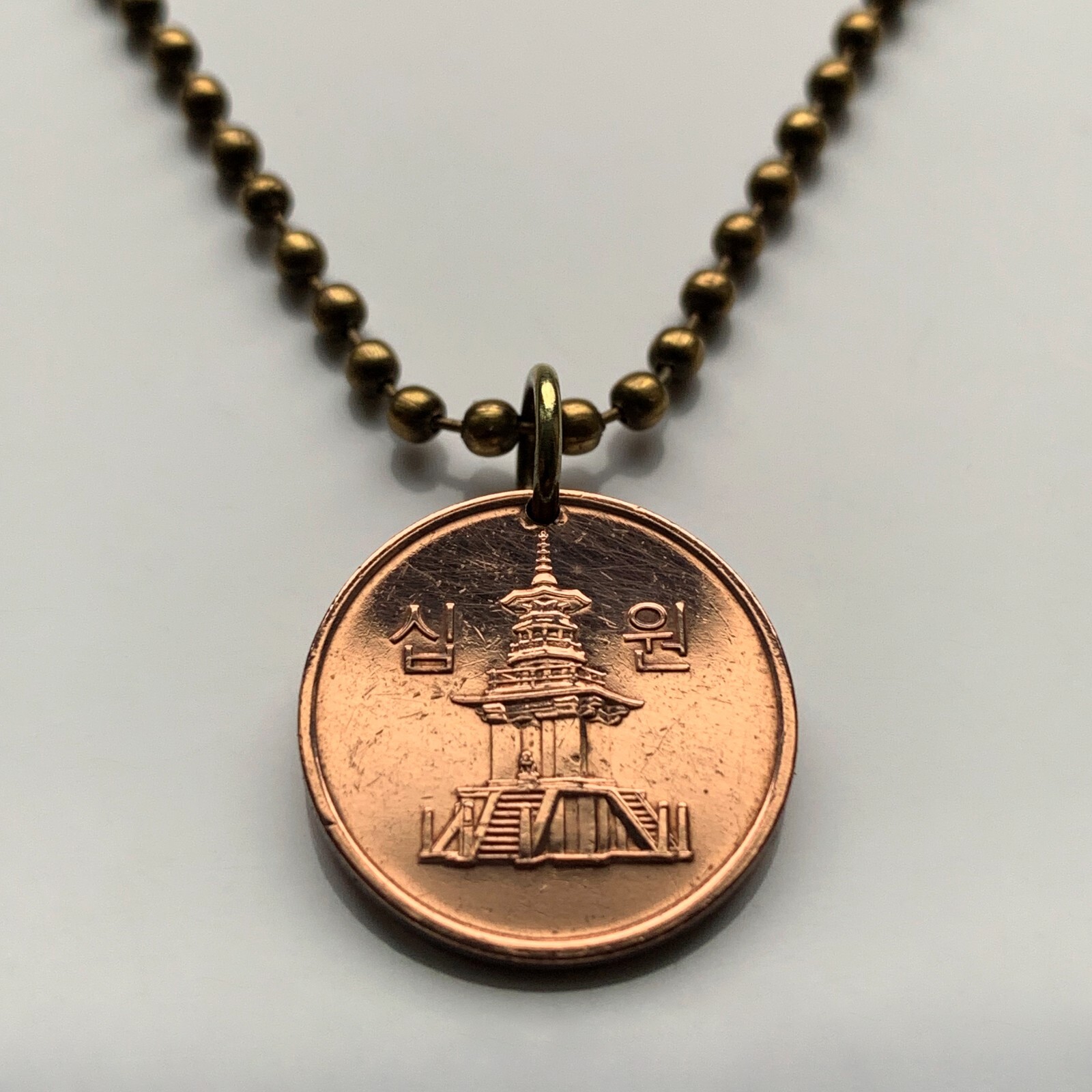 2007 South Korea coin pendant stone Dabotap Pagoda temple Bulguksa Seoul n000549