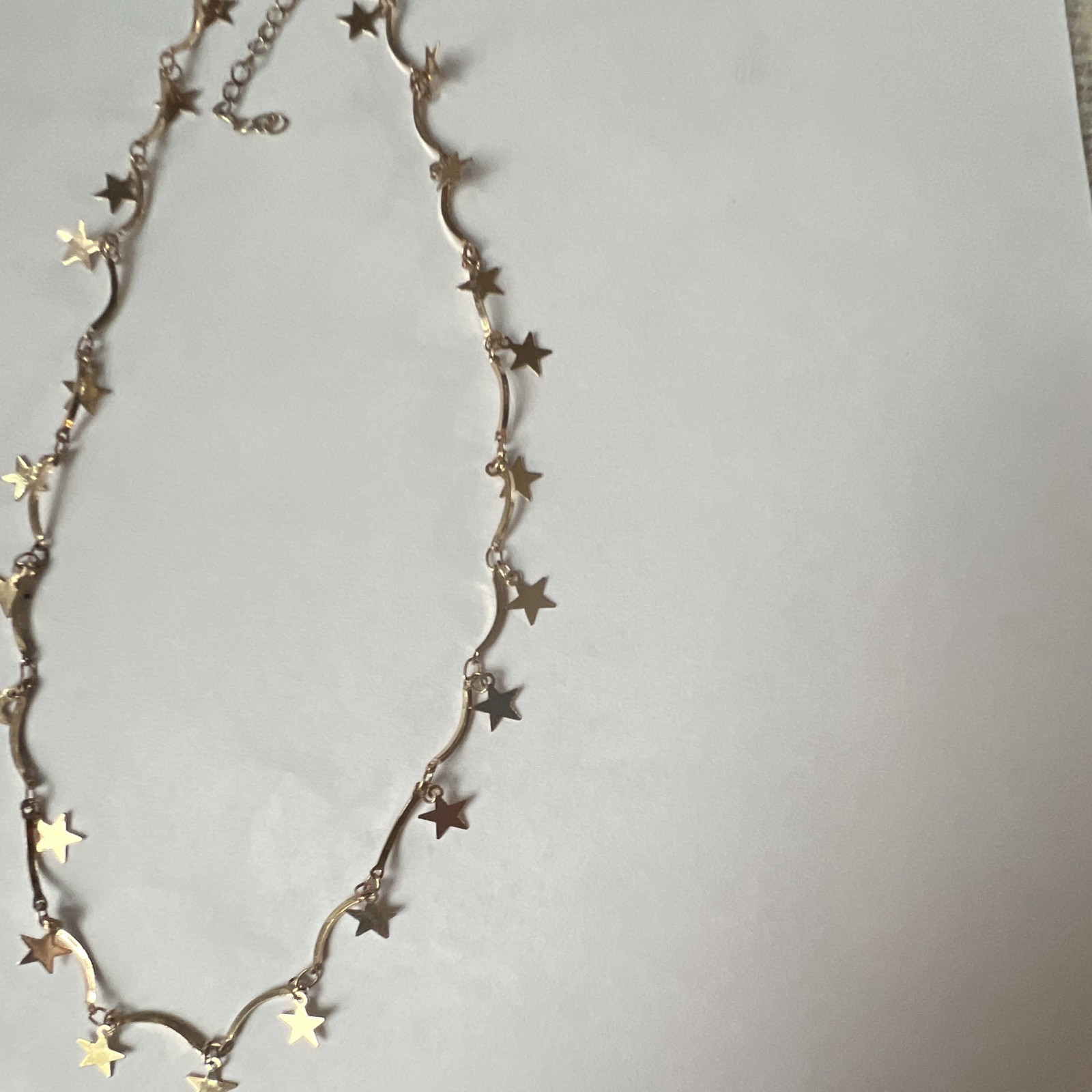 Gold Star Necklace With Silver Clasp