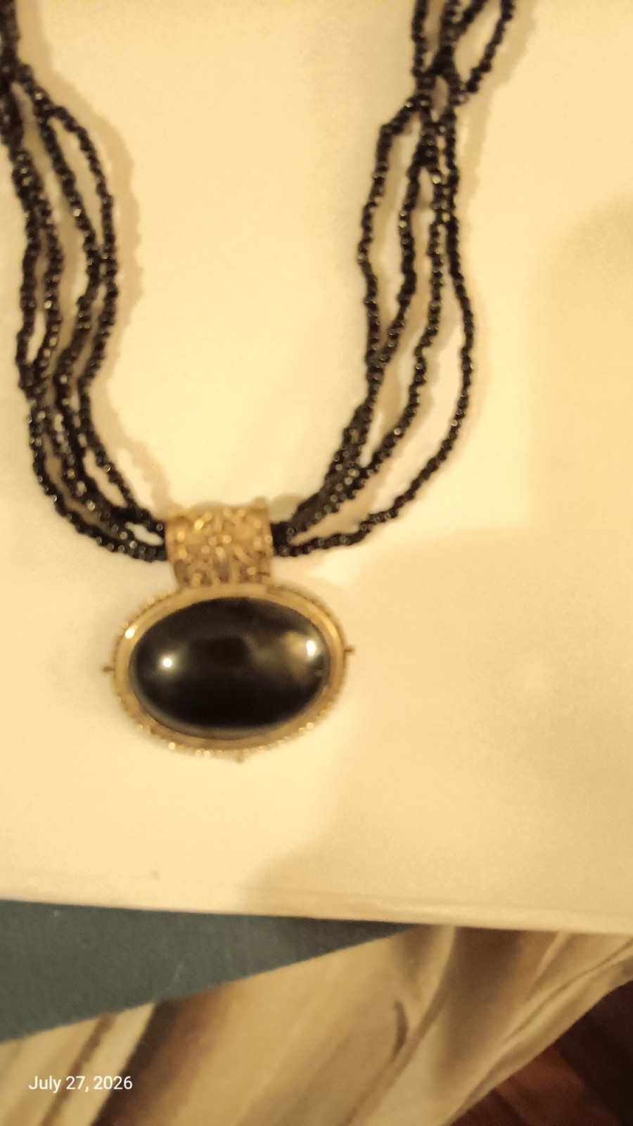 Black Seed Beads With Silver Tone & Black Sliding Pendant Necklace by Avenue
