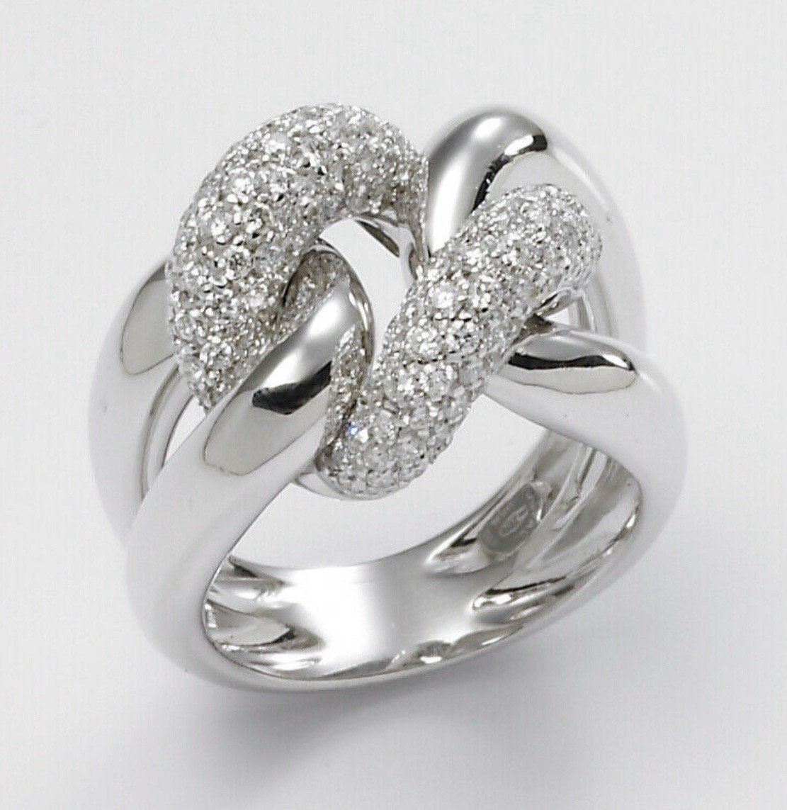 18kt WHITE GOLD GROUMETTE RING. WITH NATURAL DIAMONDS ct. 1.57 AND WARRANTY