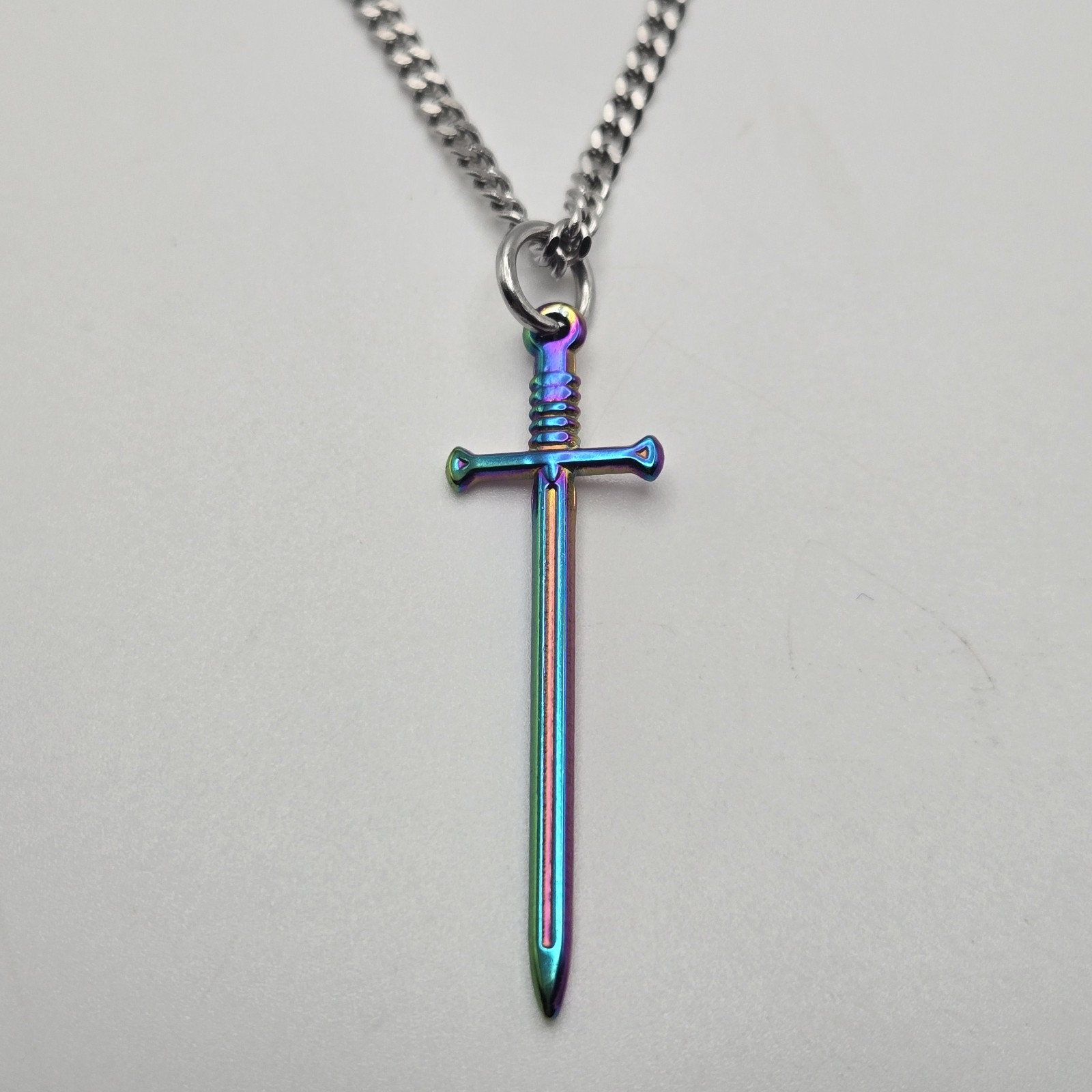 MULTI COLOR SMALL SWORD CHARM / 18″-24″ STAINLESS STEEL CURB CHAIN NECKLACE