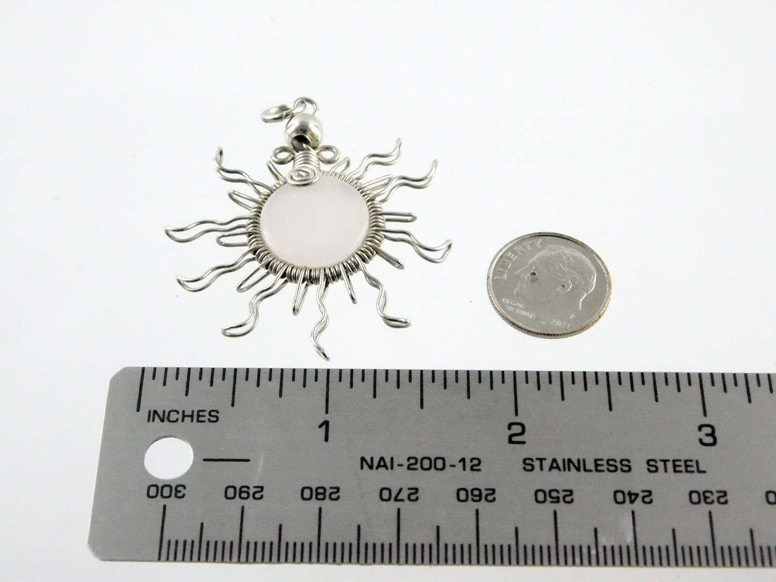 Unmarked Silvertone Metal and Wire Wrapped Quartz Sun Pendant 1.75 Inches 6g