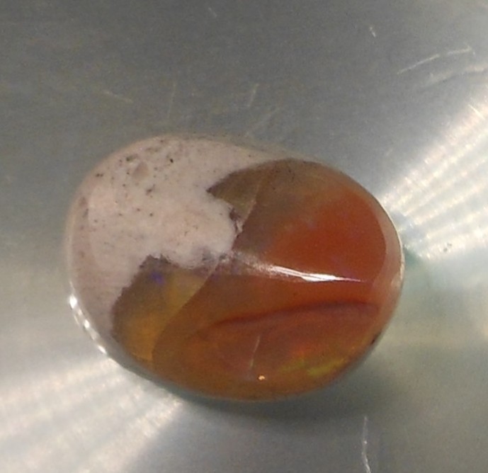 8.70 carats Mexican Fire Opal Freeform shape 15x11x8mm (approx)
