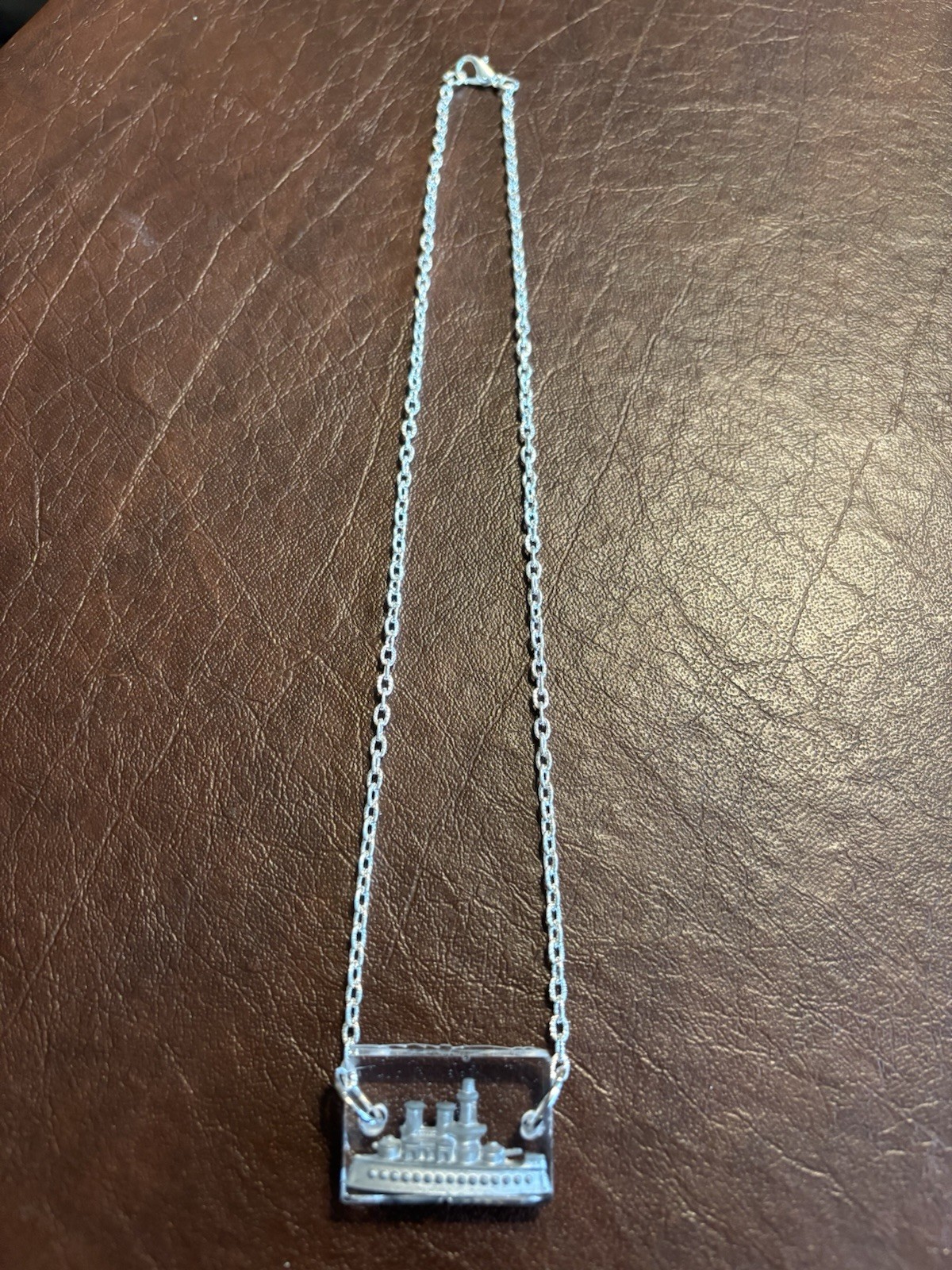 Vintage, Metal Ship Game Piece, Suspended in Resin, on a Silver Plated Chain.WOW