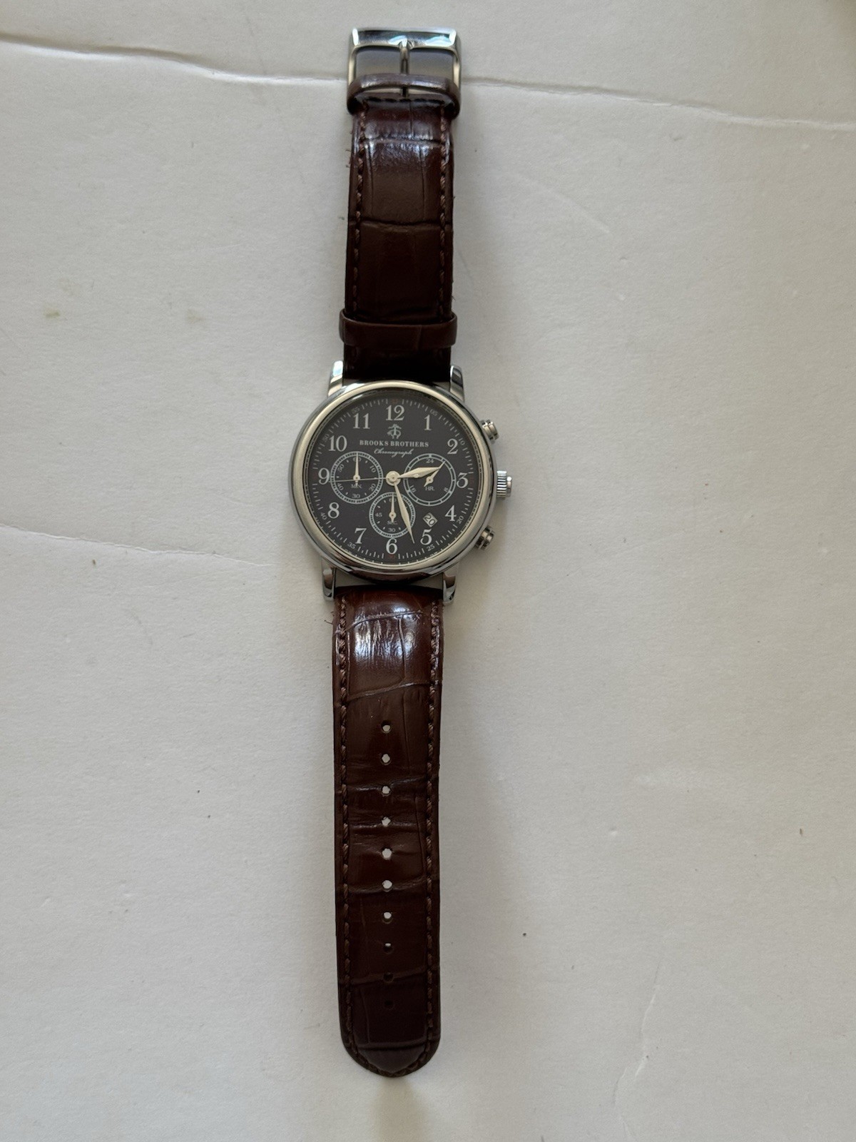 Brooks Brothers Men’s Navy Blue Bezel Watch with Brown Leather Strap and Case