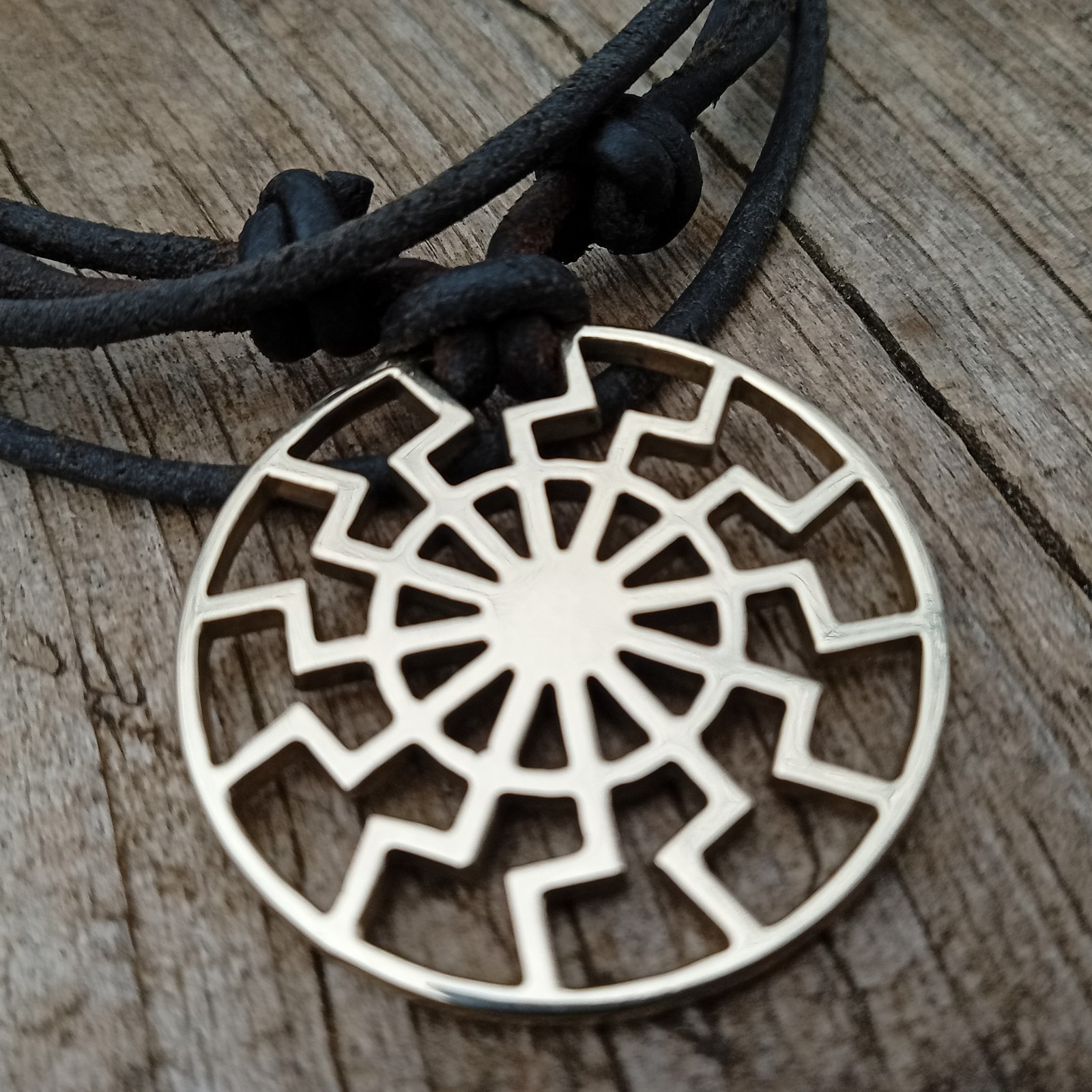 Black Sun Pendant Necklace – Brass Sonnenrad Medallion on Black Cord