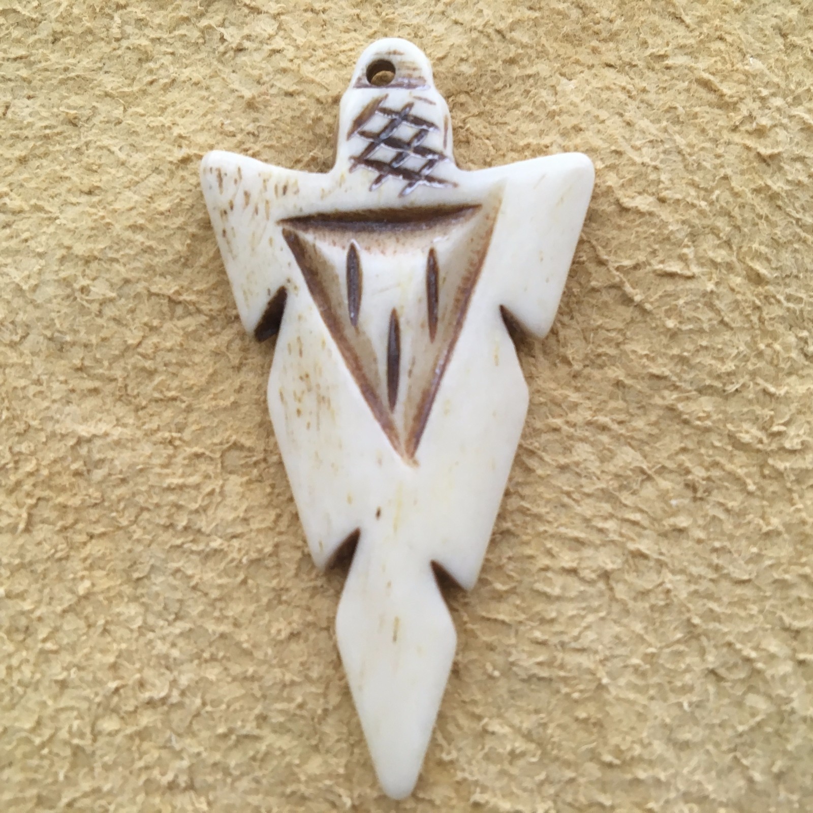 53x29mm Antiqued Arrow Hand Carved Bovine Bone Pendant, one (1) Pendant