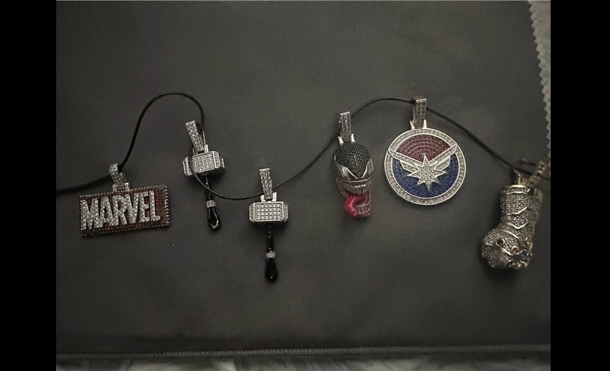 Marvel iced out pendants (GLD) 6 pendants in all. $50 a pc or $200 for all!