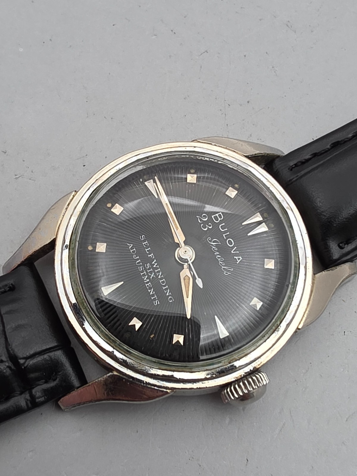 Vintage Bulova 23 “A” Men’s automatic watch 10K RGP Black Sunburst dial 1955