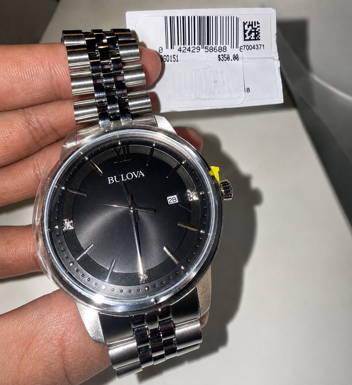 Bulova Surveyor Men’s Quartz Watch, Black Dial, Silver Steel Bracelet 39mm