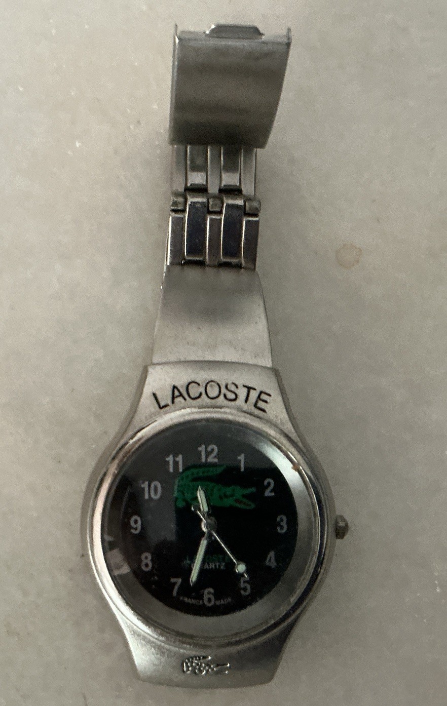 2 quartz watches needing a battery. 1) Lacoste . Good condition. 2) ￼Madison