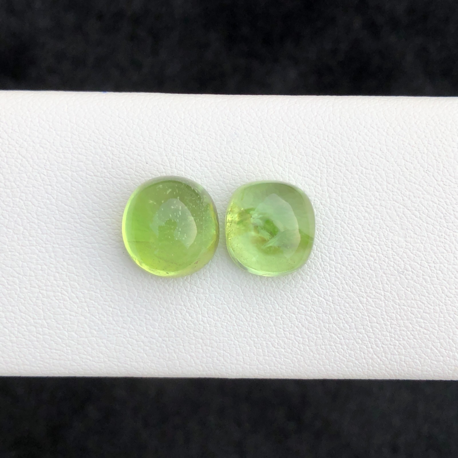 13.80 Carat Natural Peridot Pair: Round Cut Green Gemstones